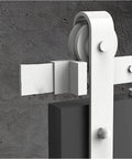 Close-up of 5 Ft Bypass Barn Door Hardware Kit For Double Doors with white sliding track and quiet glide mute rollers.