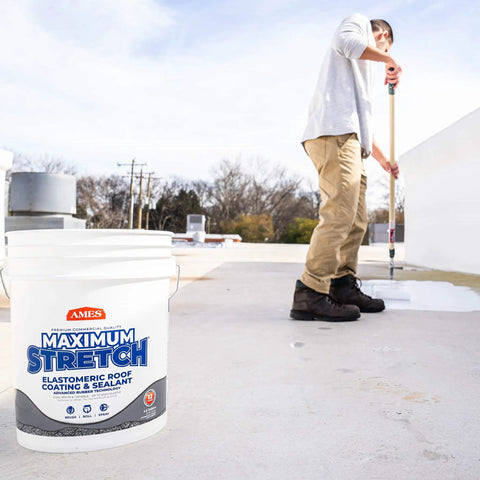 Max Stretch Roof Coating White Elastomeric Sealant For Flat And Low Slope Roofs One Gallon bucket next to applied coating on roof
