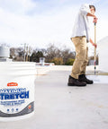 Person applying Maximum Stretch Waterproof Sealant Membrane For Roofing, Repairs, Concrete, EPDM And Wood, DIY, 4.6 Gallon, USA