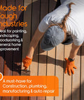 Top-down view of orange nitrile gloves (medium) on hands painting a wooden deck with a brush; diamond-textured grip