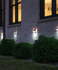 Architectural Outdoor Solar Wall Light With Motion Sensor 120 Lumens Dual Color Aluminum lights on brick wall night view