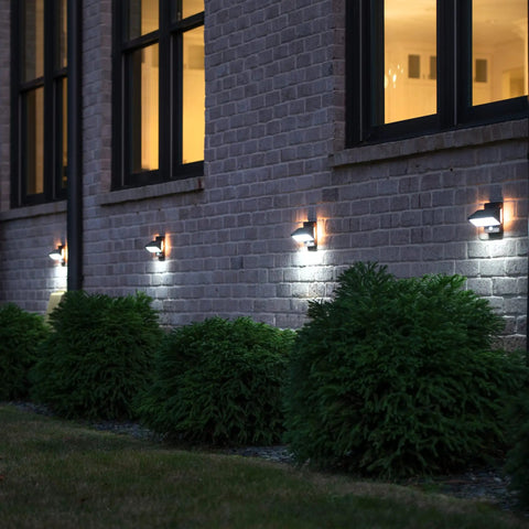 Architectural Outdoor Solar Wall Light With Motion Sensor 120 Lumens Dual Color Aluminum lights on brick wall night view