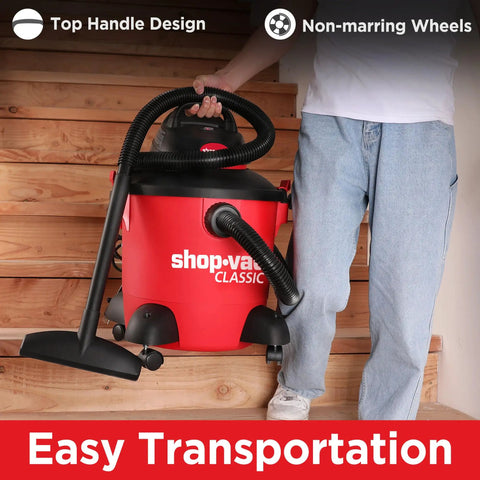 Person carrying 8 Gallon Wet Dry Vacuum With 4.5 Peak HP Motor, 3 In 1 Multi Function, on stairs demonstrating easy transportation.