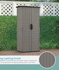 Vertical Outdoor Storage Shed with 22 Cubic Feet of Capacity, lockable double doors, weather resistant resin panels in backyard