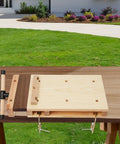 Beefy Portable Wooden Workbench With Woodworking Vise and C Type Clips, showcased outdoors on a green lawn.