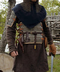 Heavy Duty Medieval Sword Belt And Scabbard Set For Knights Straight Up Classic Reenactment Wear That Goes Hard Legit Leather Build In Black Or Brown That Holds Its Ground For Folks Prepping For The Big Festival on a knight in armor.