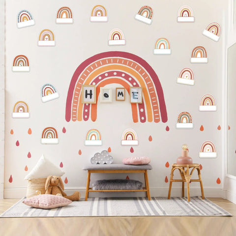 Rainbow Cutouts For Classroom Decor on wall, boho rainbow name tags, cozy kids' playroom with cushions and toys.