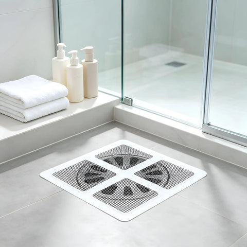 Hair Drain Stickers 100Pcs Disposable Self Adhesive in a shower setting with toiletries and towels.