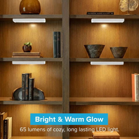 Two Pack Wireless LED Under Cabinet Lights Battery Operated Eight And A Half Inch Long Sixty Five Lumens Tap Light on shelf