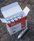 Open box of 12 Gram CO2 Cartridges Non-Threaded For Paintball Guns Pellet Guns BB Guns And Airsoft Guns High-Grade CO2 Cylinders