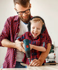 Child wearing 3 Pack Kids Noise Reduction Headphones For Ear Protection Earmuffs 27dB while using a drill with an adult.