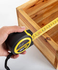 33 Ft Tape Measure With Magnetic Hooks And Fraction Markings measuring wooden box corner