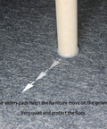 Round Furniture Sliders 1 1/8 Inch Glides 16 Pack PTFE Bottom Shields under a chair leg on carpet for easy movement.