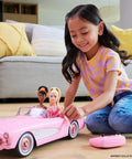 Child playing with Remote Control Corvette Toy Car From Barbie Movie With Full Function RC Open Trunk Front Seats For Two Barbie Dolls Accessories Sold Separately Epic Play Vehicle For Barbie Fans And Collectors