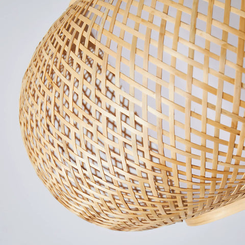 Close-up of basket weave bamboo pendant light with natural rattan shade, 15 inch single bulb chandelier for kitchen island or nursery.