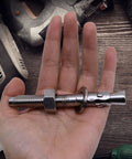 Person holding 304 Stainless Steel Concrete Anchors Wedge Anchor Fasteners One Half Inch By Four Inch Pack Of 10 Heavy Duty