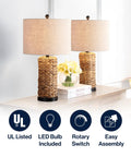 Natural Coastal Water Hyacinth Table Lamp Set Of 2 With Light Grey Linen Shade For Living Room Or Nightstand Cozy Chic Boho Farmhouse Decor LED Bulbs Included ETL Listed Safety 25 Inch Tall Lamps on a sideboard next to books and flowers.