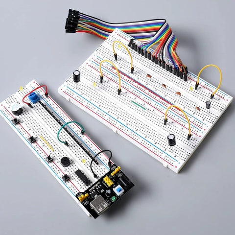 Assembled circuit on Ultimate Solderless Breadboard Kit Set With 2 400 Point Boards And 2 830 Point Boards For Fast Prototyping on desk