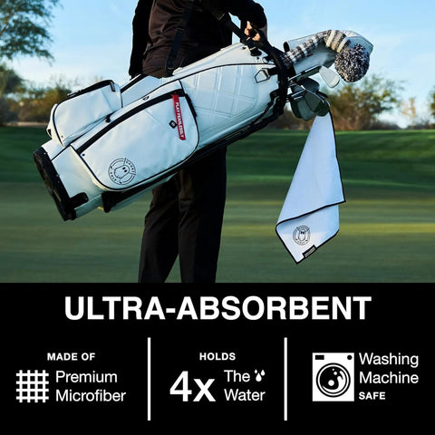 Golfer carrying bag with Greenside Magnetic Golf Towel Ultra Absorbent Microfiber Sidekick, 18 by 18 inches red waffle weave.