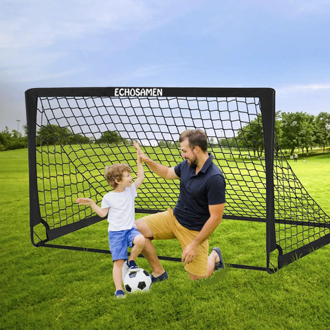 Backyard Kids Soccer Goal Set Two 6x4 Ft Portable Soccer Nets with father and son playing in a grassy park setting
