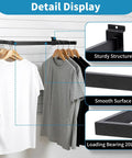 Slatwall U Shaped Hangrail 24x12 Inch Tubing for retail displays and home garment storage, shown with clothes hanging on it.