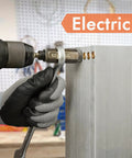 Rivet nut installation tool in use; drill driving zinc-plated rivnut into metal panel, gloved hand