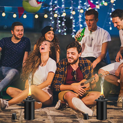 Group enjoying outdoor party with Six Pack Citronella Torch Replacement Canisters 16 Oz Refillable Torches as mosquito repellent