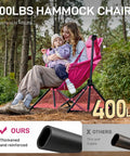 Woman with child in pink Padded Oversized Hammock Camping Chair With Multi Storage Pockets, outdoor setting, supports up to 400 pounds