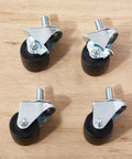 Heavy Duty Two Inch Low Profile Refrigerator Caster Wheels Set Of Eight With Half Inch Thirteen Stems plus black swivel wheels and metal fittings.