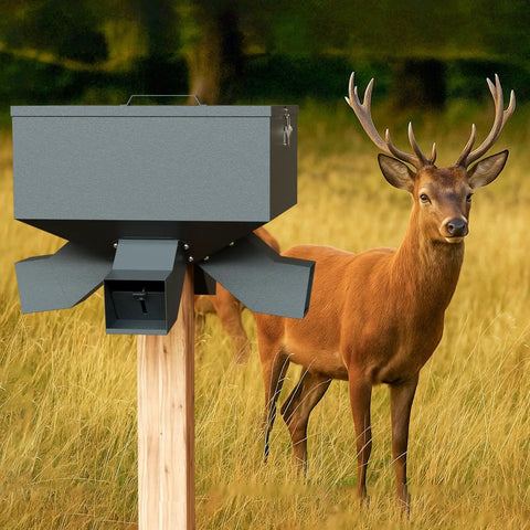 Hella Durable Metal Gravity Deer Feeder With Eighty Pound Capacity And Four Wide Feeding Ports weather proof feeder next to deer in grass.