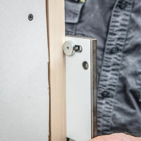 Close-up of No Fuss Adjustable Door Latch And Strike Plate Router Jig showing adjustable aluminum plate mounted for precise mortising.