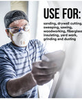 Person wearing All In One N95 Respirator For Sanding Drywall Painting And Woodworking With Exhalation Valve Directing Air Downward