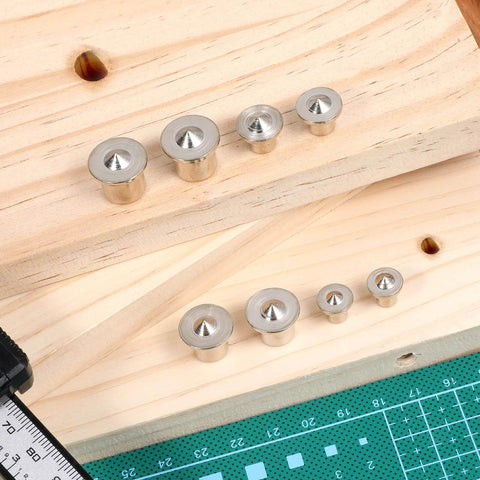 "Handy Doweling Pin Center Drill Set With Sharp Point Transfer Plugs In One Quarter, Five Sixteenths, Three Eighths, And One Half Inch Sizes, Twenty Piece Carbon Steel Doweling Centers For Quick And Precise Woodworking Holes shown on wooden surface"
