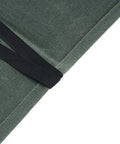 Close-up of green Waxed Canvas Knife Roll Bag With Seven Slots showing durable fabric and stitching