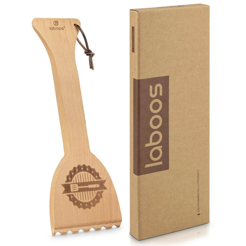 Beech Wood BBQ Grill Scraper next to packaging, part of Beef Up Your Grill Game With This Beech Wood BBQ Grill Scraper Fits Traeger