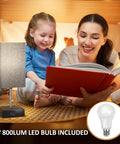 Gray Bedside Table Lamp With USB C And USB A Ports Three Color Temperature Settings For Warm Neutral And Daylight Ambience Ideal Nightstand Desk Light With Pull Chain And Bulb Included next to a reading family on a cozy evening.