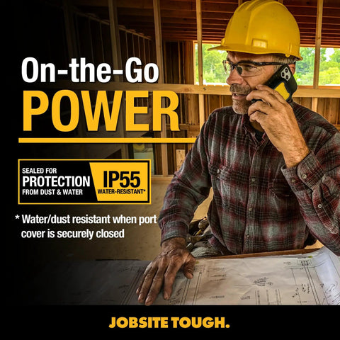 Construction worker on phone using Beefy Magnetic Power Bank 5000mAh Wireless Charger With 18W Fast Charge Rugged Water Resistant Portable Battery