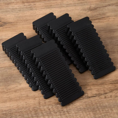 Pack of six Rock Solid Black Rubber Wedge Shims for Furniture Leveling, sturdy 93x40mm tapered anti-slip pads.