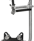 Side view of Strong Hand Tools CPL45 pipe fit-up clamp for 2-4 in pipes, mounted on a vertical stand
