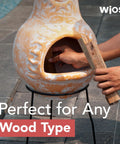 Medium Outdoor Chiminea Fireplace For Patio With Clay Chimineas Rain Lids And Solid Metal Stands Yellow Terracotta Chiminea Rustic Wooden Fire Pit 16 By 16 By 32 Inch Cozy Backyard Vibe by a poolside