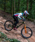 Boy riding downhill wearing Kids Mountain Bike Pants for Boys, Quick Dry, Lightweight, Breathable MTB Pants, Black, Size 12