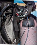 Scuba diver adjusting scuba tank with Scuba Tank Valve Cap And Dust Cover End Cap Protector For Air Cylinders in marine setting