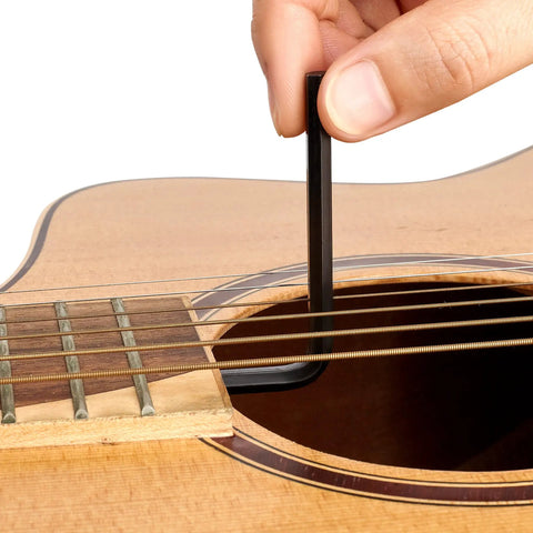 Using All In One Guitar Luthier Repair Kit With Ball End Truss Rod Wrenches And Precision Allen Wrenches on guitar soundhole