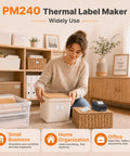 Woman organizing items with Straight Up Game Changer Label Printer Slick Chip Yields Crisp 203 Dpi Output Zero Ink Or Toner Drama Comes With Three Heavy Duty Tape Rolls For Lazy Weekend Organizing.
