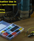 670 Piece Heat Shrink Tubing Kit With Wire Stripper Cutter, 2 To 1 Shrink Ratio on a workbench with open application chart