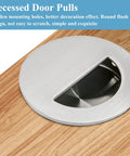Close-up of 2 Pcs Round Hidden Flush Door Pulls Recessed Stainless Steel Handles In Brushed Nickel Finish, installed on wooden surface
