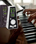 Digital Metronome For Piano Violin Ukulele Guitar And More With Voice Counting Timer Function Rotary Tempo Knob 40 To 208 BPM Precise Tempo 9 Rhythm Patterns Battery Operated LED Display Practice Friendly next to hands playing piano.