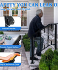 Man using Super Tight Grip Outdoor Handrails For Steps And Indoor Stair Railing Kit Black Iron Guard with classy scroll patterns.