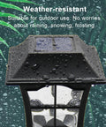 Top view of 4 Pack Solar Wall Lanterns Lights Outdoor Waterproof 15 Lumens Per LED Two LED Bulbs Wall Mount Kit Included under rain.