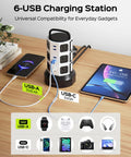 12 Outlet Surge Protector Tower With 6 USB Ports And 2 USB-C, 6.5 Foot Extension Cord For Home Office Setup on a desk with devices